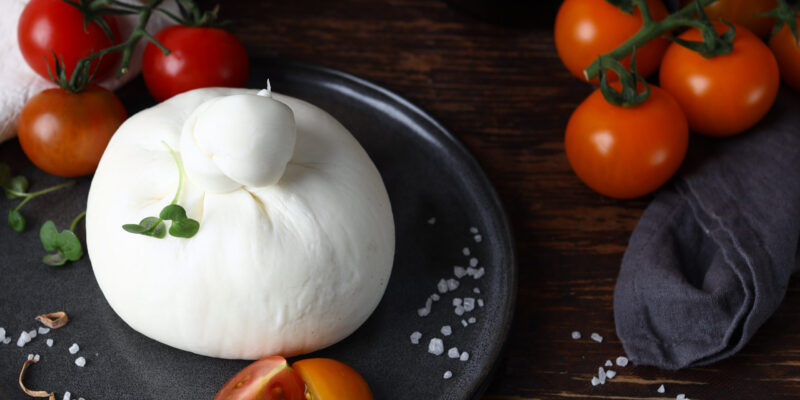 homemade soft burrata cheese with tomatoes
